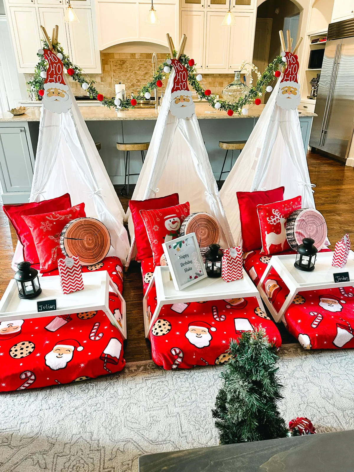 Five Christmas teepees in a bright living room